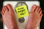Lose Weight Now - Man's Feet on Scale (CC)