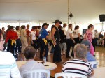 Line Dancers in a tent (CC)