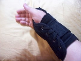 My arm in black brace
