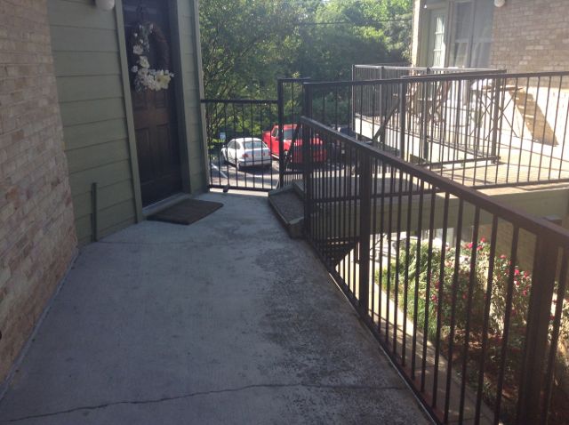 4. On the second floor balcony heading toward the parking lot...