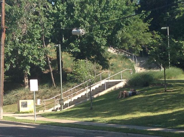 21. I'm walking up the street back to my apartment; this is another shot of the STAIRS heading up to the Katy Trail which is up about the height of a three story building. The trail is HIGHER than me when I'm standing on the second floor balcony that was in one of the earlier shots.