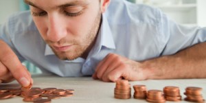 man counting coins